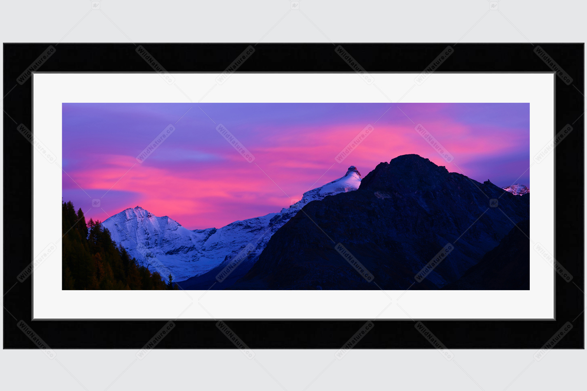 Framed photo with a sunset from the Swiss Alps